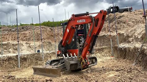 how to put track back on mini excavator|install rubber track mini excavator.